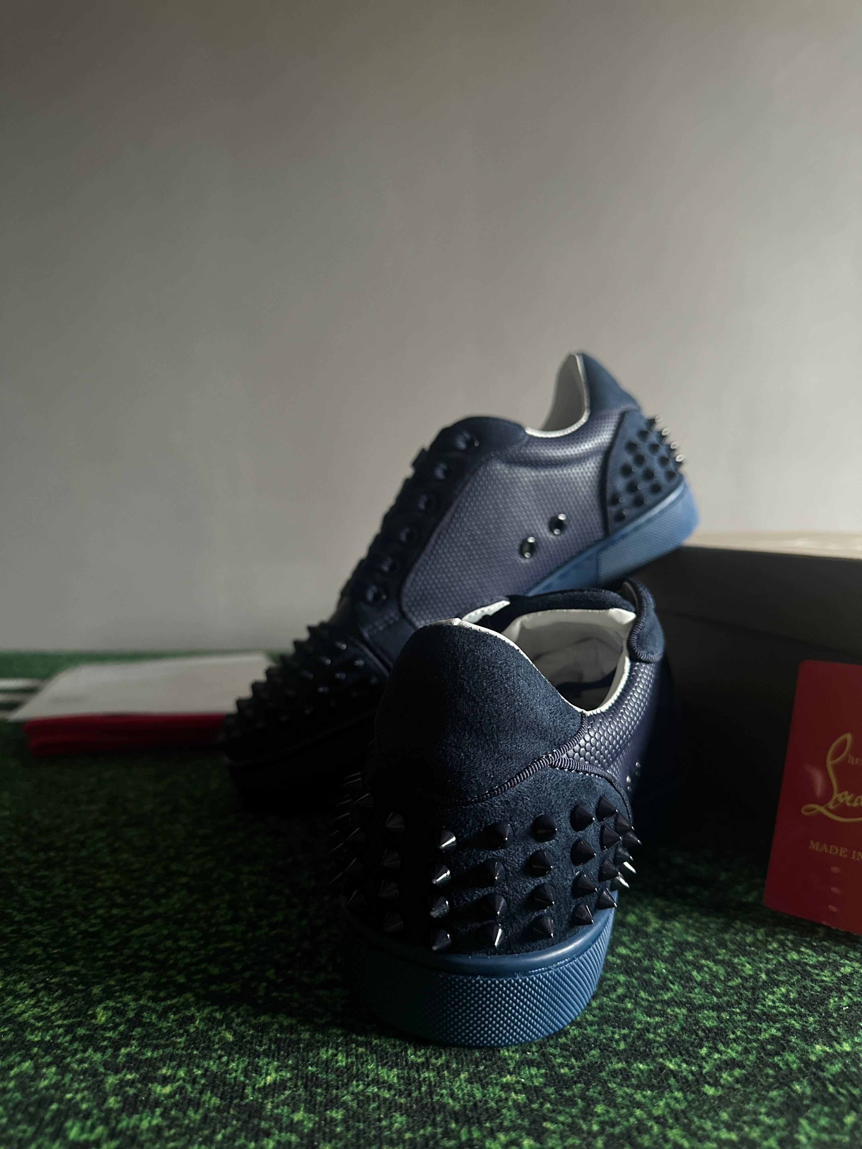 C. Louboutin sneakers