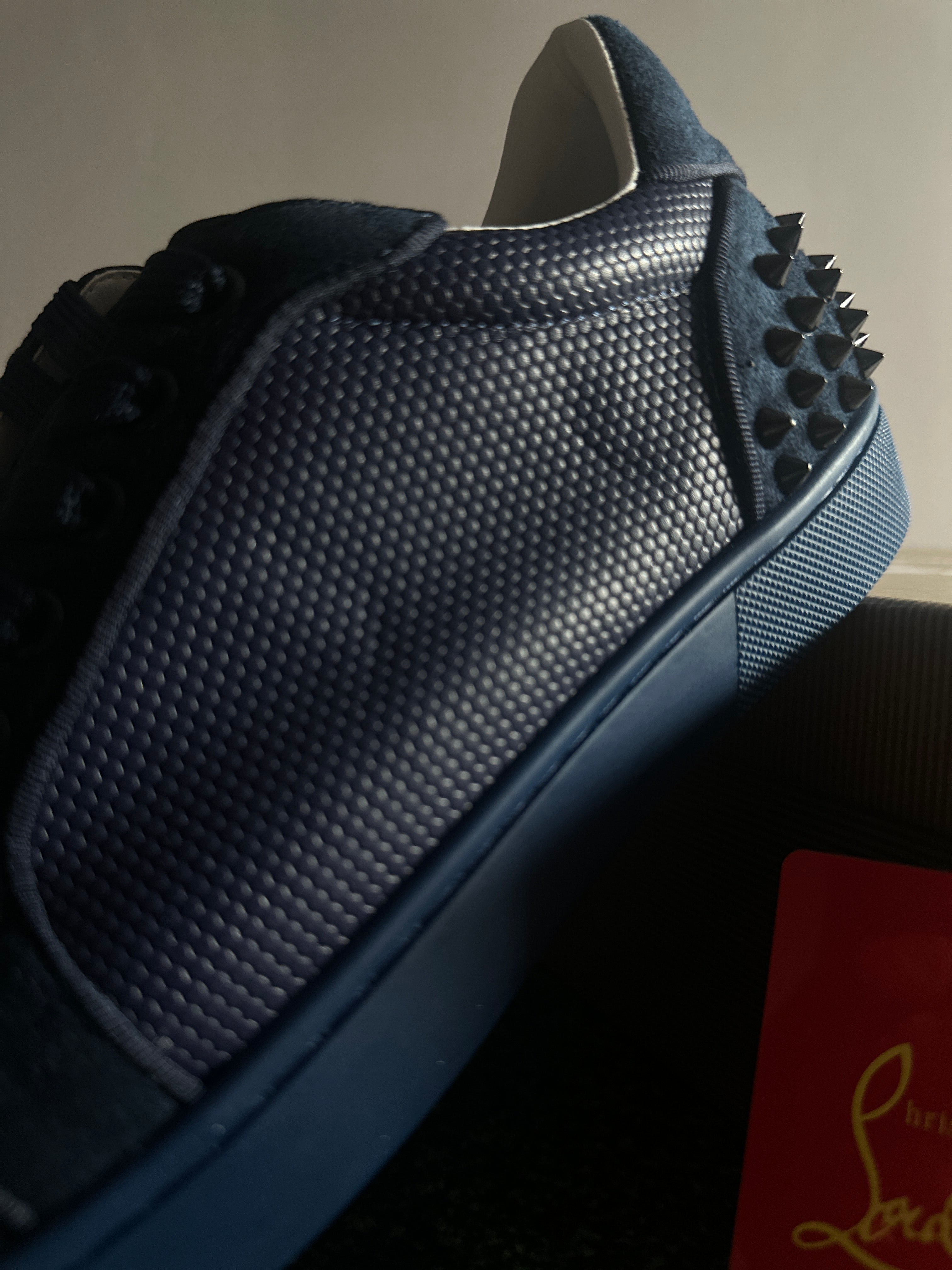 C. Louboutin sneakers