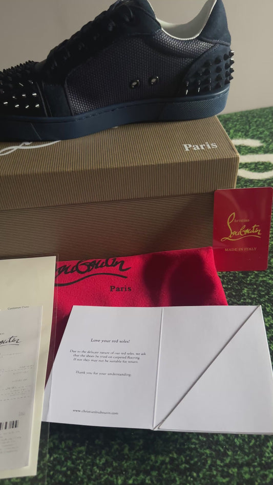 C. Louboutin sneakers